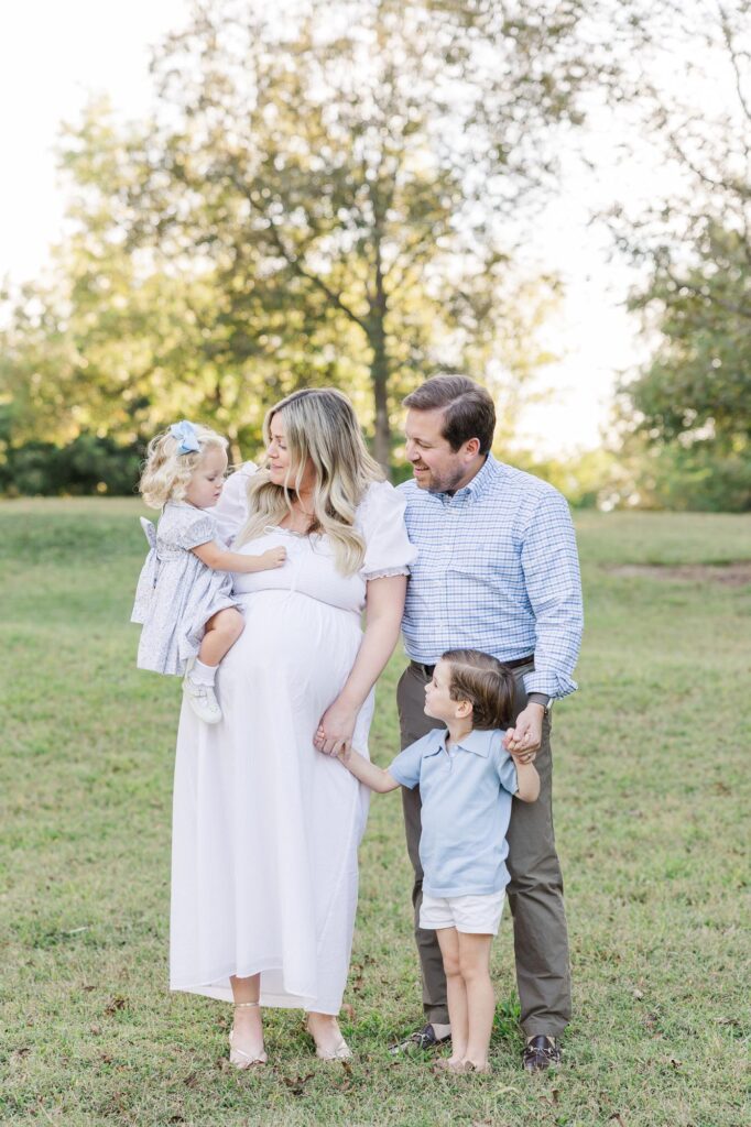 A family playing with each other during their Raleigh Fall Mini sessions